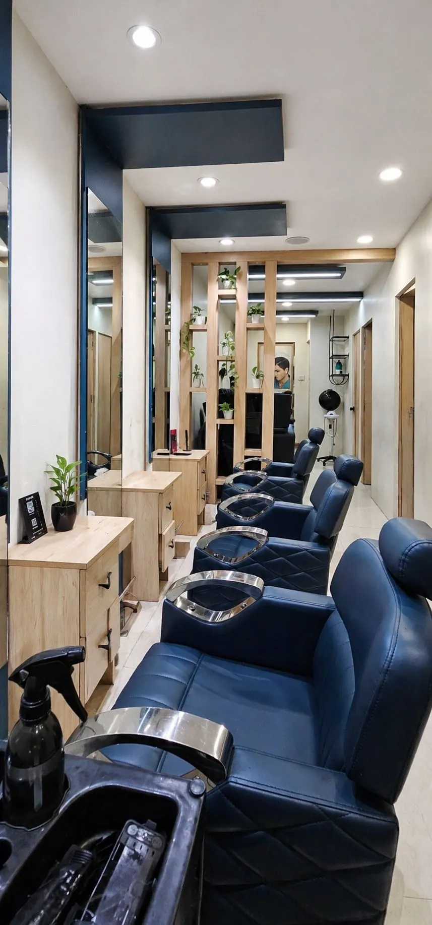 Men's grooming chairs in modern barber section